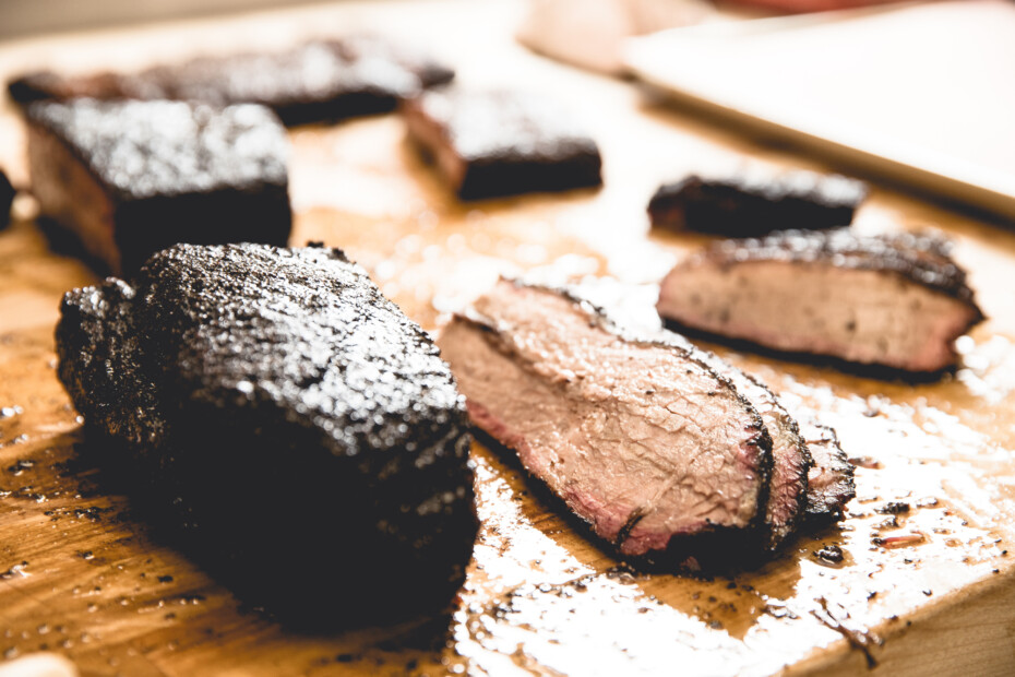 Slices Of Smoked Brisket On A Cutting Board