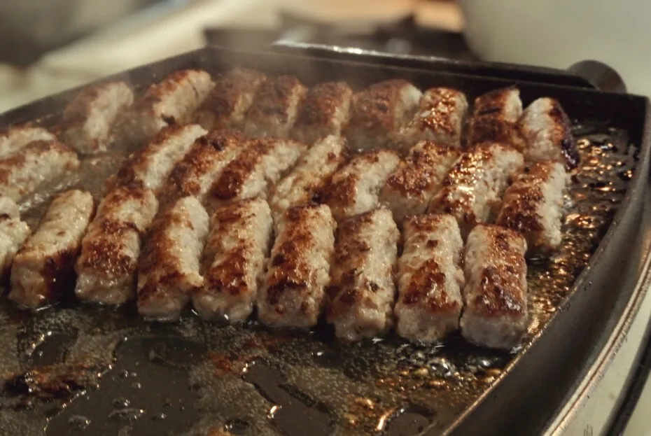 Sausages Cooking On A Griddle