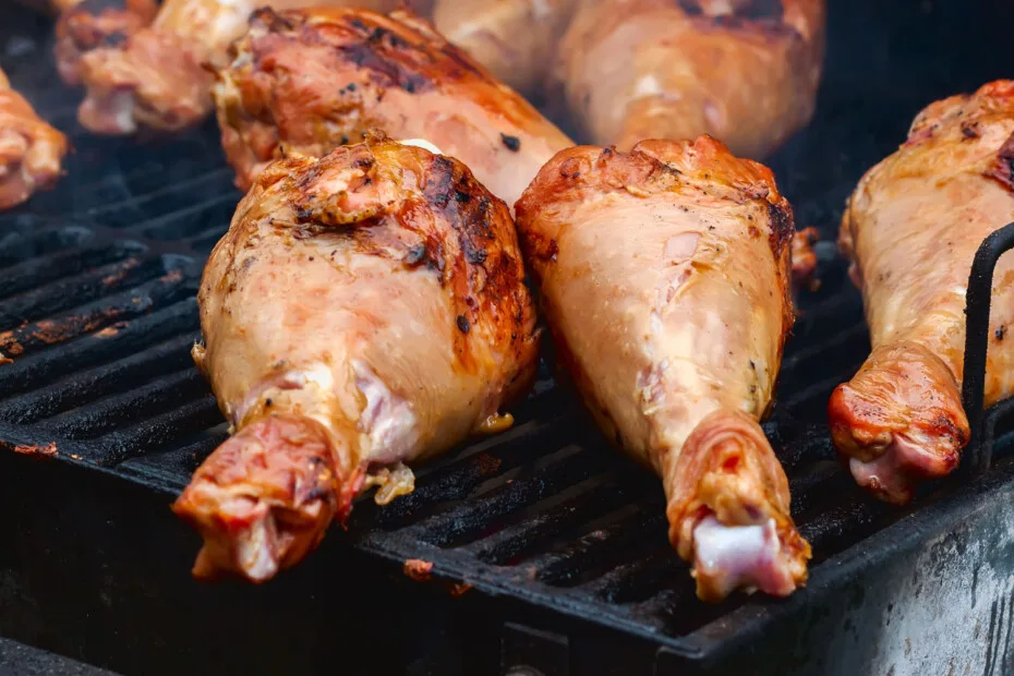 Closeup Turkey Legs On Barbecue Grill . Selective Focus