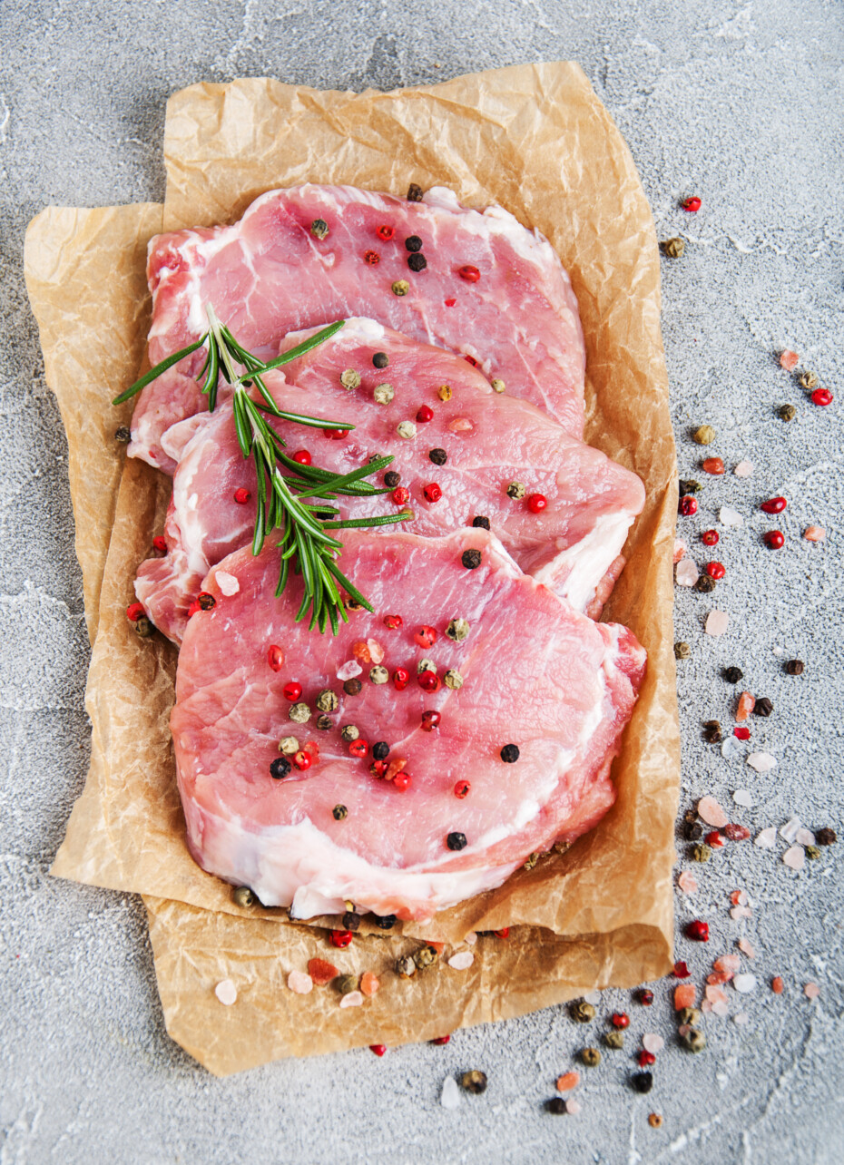 Fresh Raw Pork Chops With Spices And Herbs