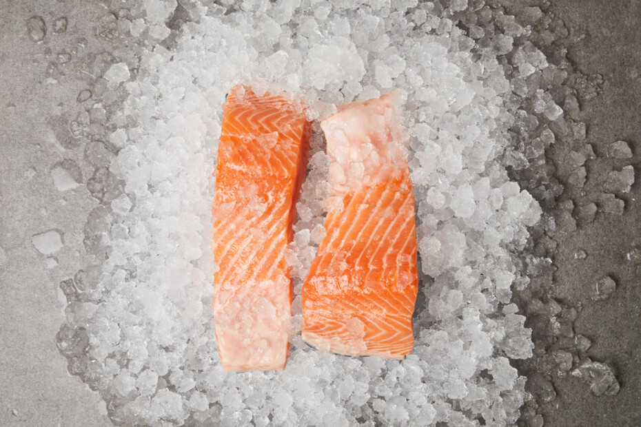 slices of salmon on crushed ice